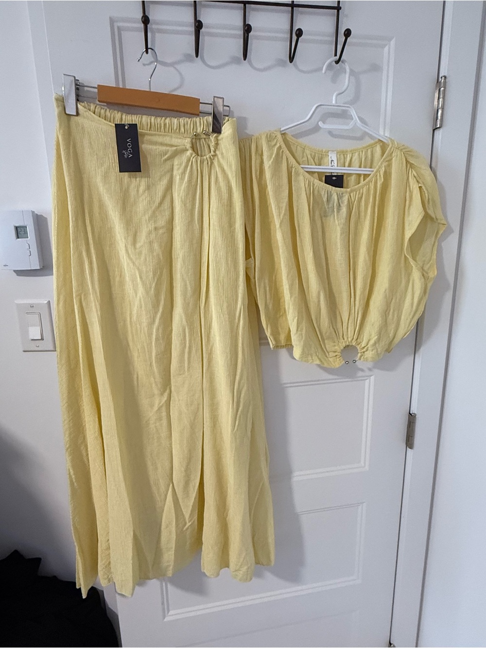Light Yellow Two-Piece Skirt and Cropped Top Set